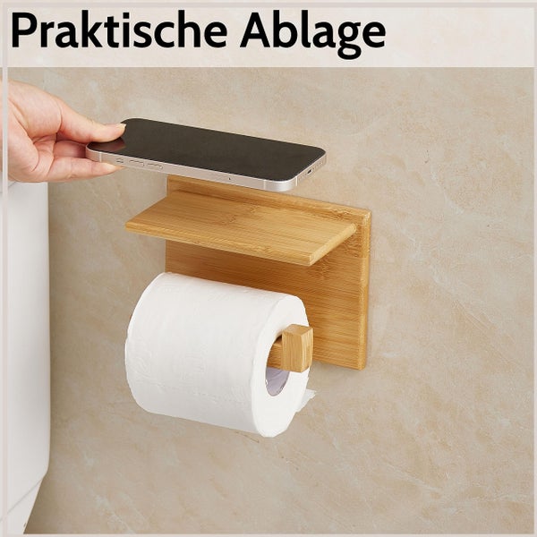 Toilettenpapierhalter aus Bambus mit praktischer Ablagefläche für ein Smartphone und einer Rolle Toilettenpapier.