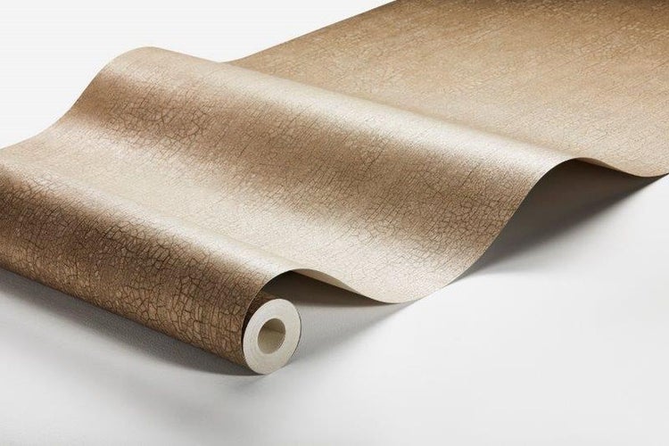 Flexible Sockelleiste aus PVC von Quest Profile auf Rolle mit Montageanleitung und Prüfsiegel