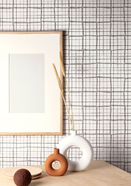 Detailaufnahme eines schwarzen Lampenfußes zur Befestigung