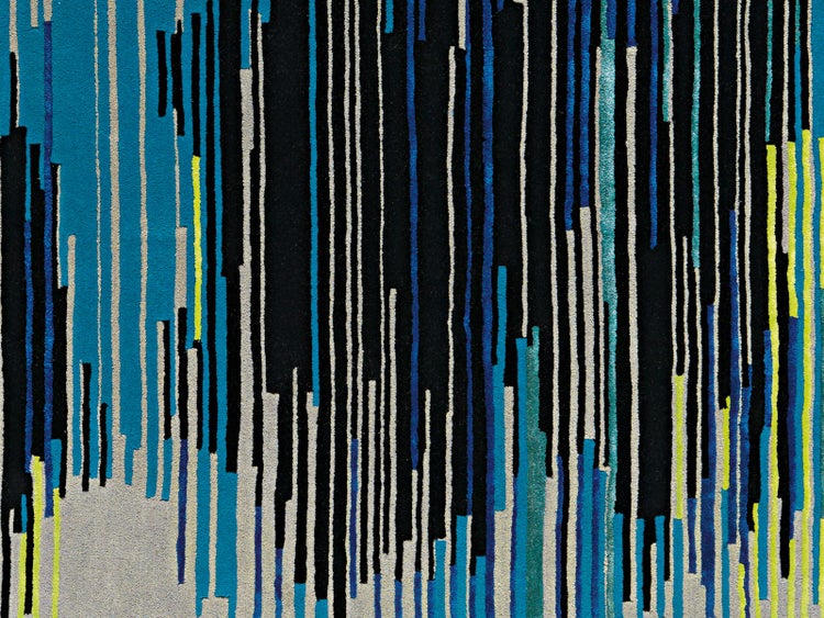 Teppich mit einem Muster aus vertikalen Streifen in verschiedenen Längen und Breiten.