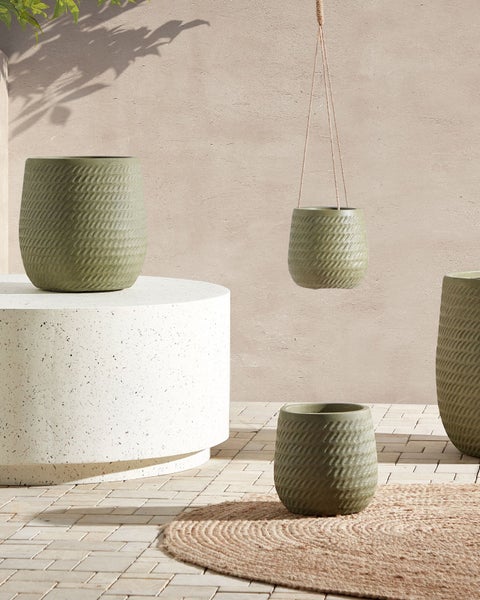Dekorative grüne Blumentöpfe aus Keramik in verschiedenen Größen und Ausführungen.
