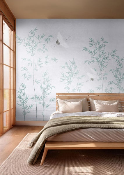Schlafzimmer mit Fototapete mit Bambus- und Vogelmotiven