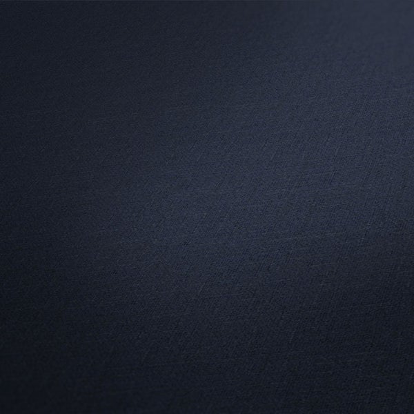 Wohnzimmer mit Ledersofa, Couchtisch, Dekoration und Ziegelwand