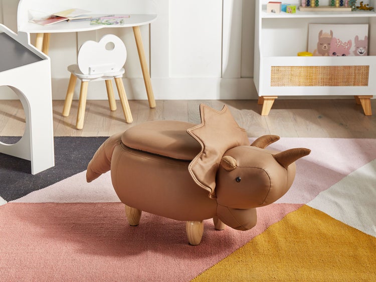Dekorativer Dino-Hocker mit Stauraum im Kinderzimmer.