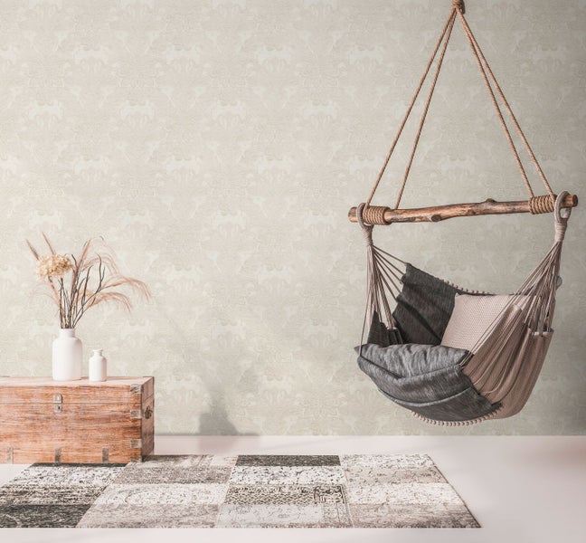 Vier Auflagen für Hochlehner-Gartenstühle mit geometrischem Muster