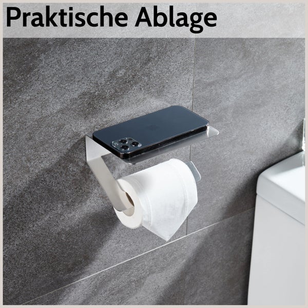 Toilettenpapierhalter aus Edelstahl mit praktischer Ablage für Smartphones, montiert an einer Wand.