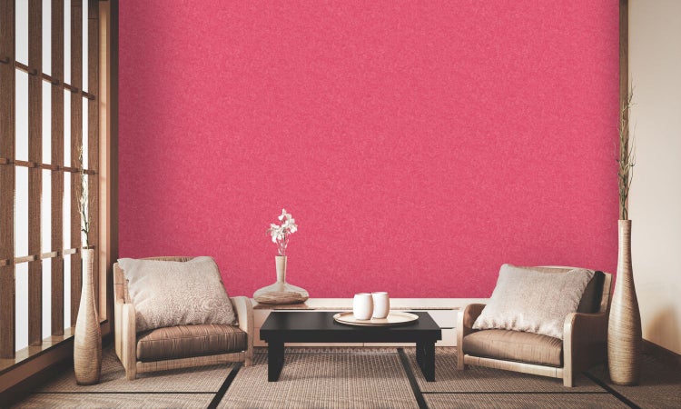 Notausgangsschild mit Piktogramm einer laufenden Person und Pfeil