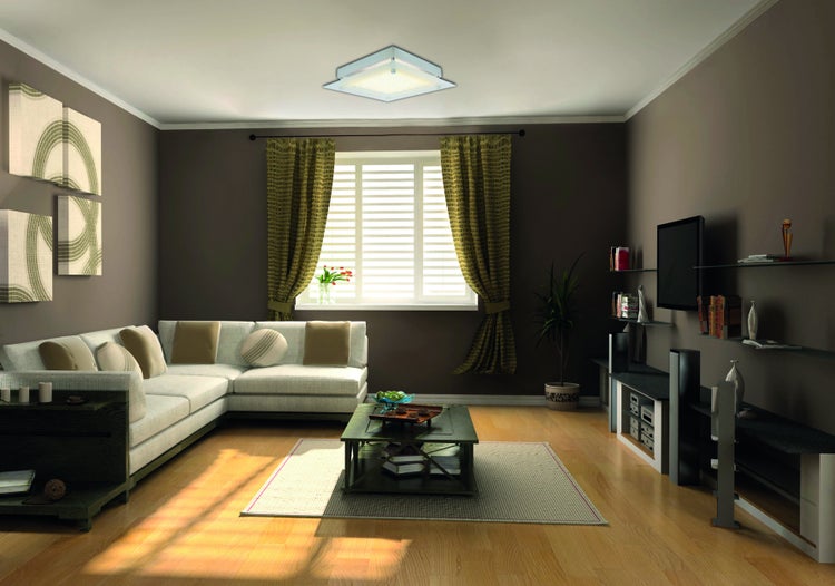Wohnzimmer mit Sofa, Tisch und Fernseher