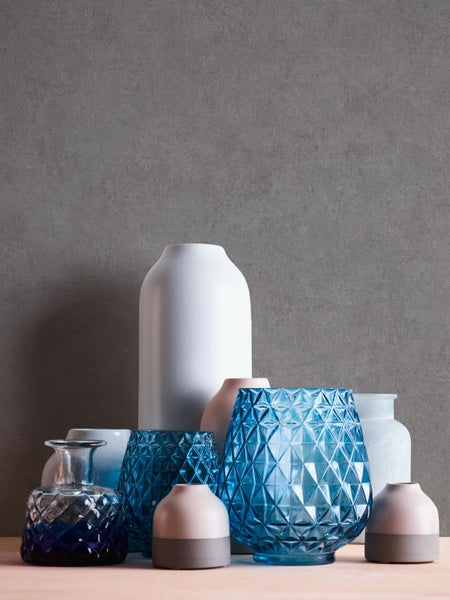 Detailaufnahme einer Hängemattenaufhängung mit Seil und Stahlrahmen