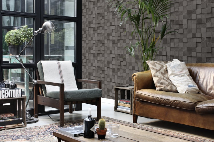 Wohnzimmer mit Sofa, Sessel, Stehlampe und Wanddekoration mit Holzoptik