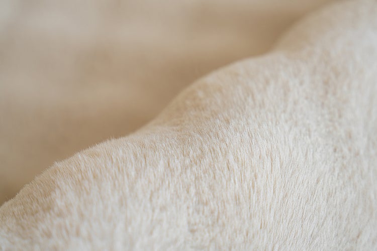 Nahaufnahme einer weichen, plüschigen Textur.