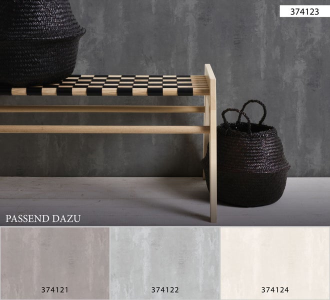 Schlafzimmer mit gemusterter Tapete, Kommode und Bett