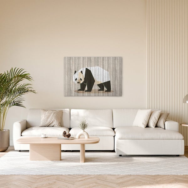 Wohnzimmer mit Sofa und Panda-Wandbild