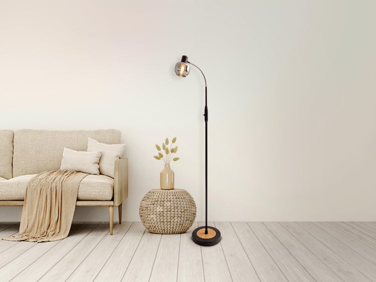 Grüne Hängeleuchte mit Netzstruktur und Glühbirne