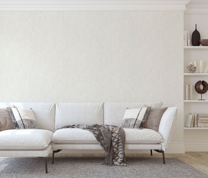 Szene im Garten mit Sonnensegel, Sitzsack und Gartentischgruppe