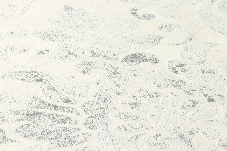 Nahaufnahme einer weißen Tapete mit floralem Muster