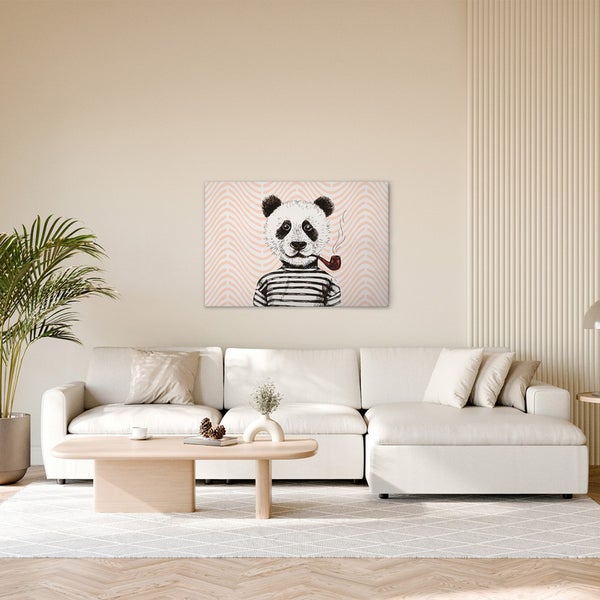 Wohnzimmer mit Sofa, Tisch und Wandbild mit Panda Motiv