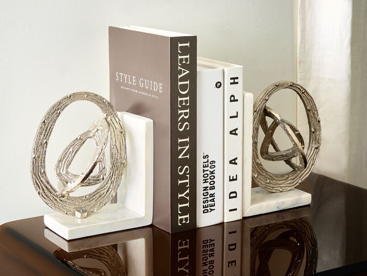 Dekorative Buchstützen mit abstraktem Design und Marmorbasis