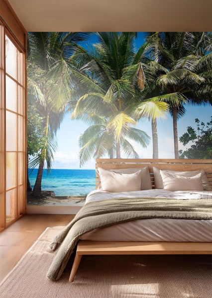 Fototapete mit Palmenmotiv in einem Schlafzimmer