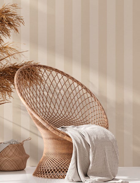 Ansicht eines Wohnhauses mit Terrasse und Garten