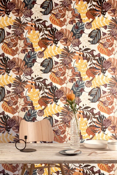 Gasgrill mit Seitenablage und Schrank zur Aufbewahrung von Grillzubehör.