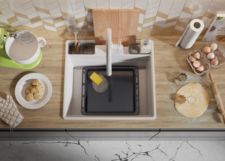 Küchenszene mit Spüle, Geschirr und Zutaten zum Backen