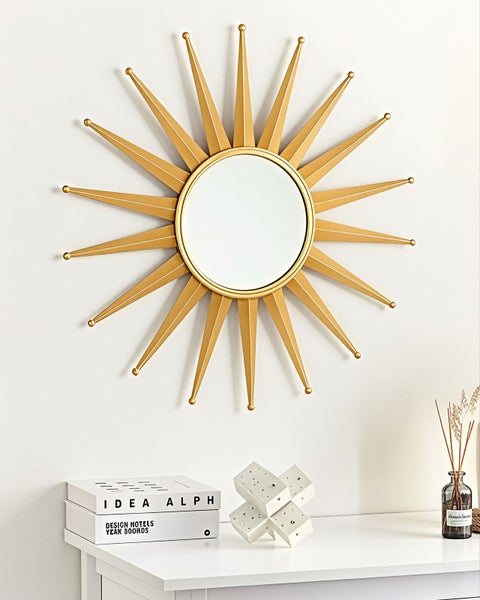 Dekorativer Spiegel mit goldenem Sonnenstrahlen-Design als Wanddekoration