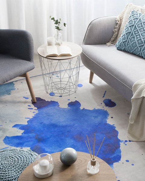 Teppich mit blauem Farbfleckmuster