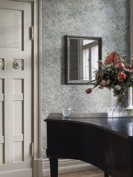 Villeroy & Boch Logo. Handtuchhaken mit Handtuch an der Wand.