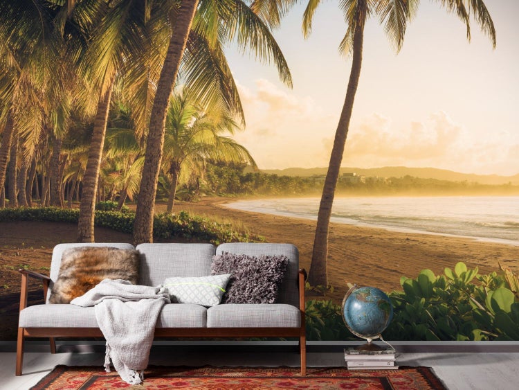 Fototapete mit einem Motiv von Palmen am Strand, die eine entspannte Atmosphäre schafft.