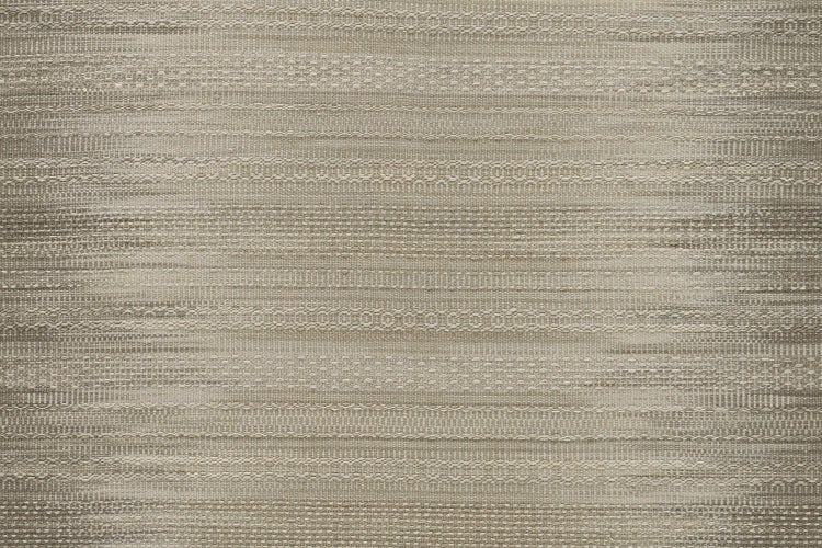 Nahaufnahme einer gewebten Oberfläche mit feiner Struktur und horizontalen Mustern.