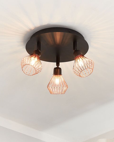 Freistehende Toilettengarnitur aus Metall mit Toilettenpapierhalter und Toilettenbürstenhalter in eckigem Design.