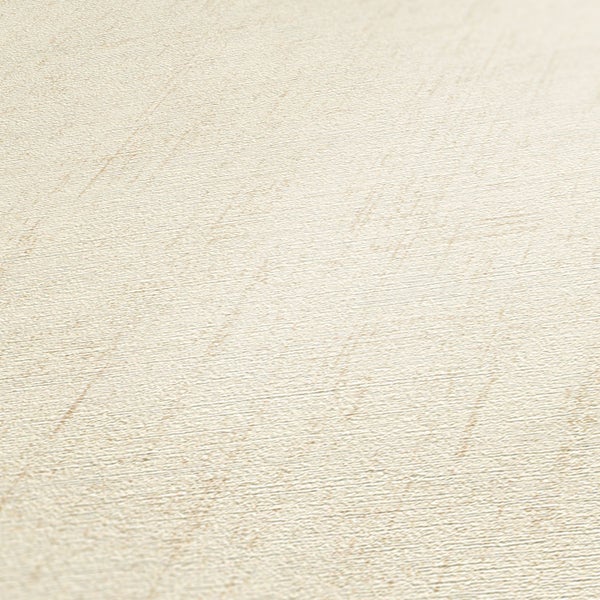 Nahaufnahme einer strukturierten, hellen Tapete.
