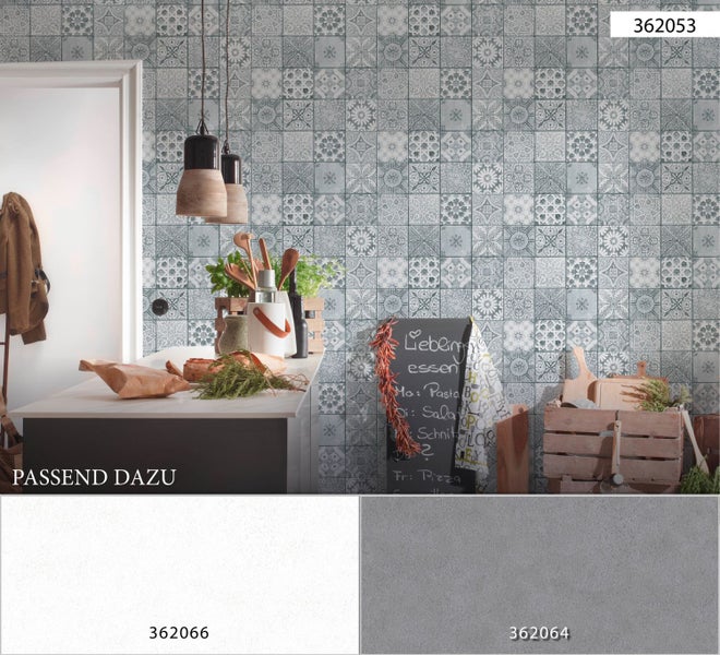 Wandgestaltung mit Fliesen in verschiedenen Mustern im Küchenbereich