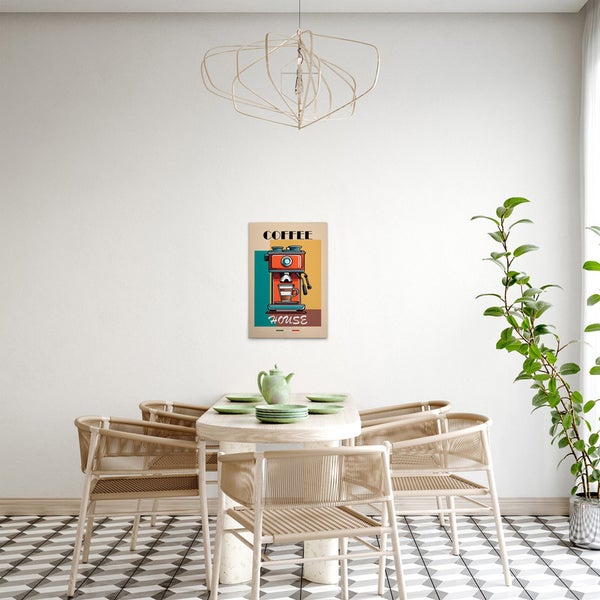 Wandbild mit Kaffeemaschinenmotiv über einem Esstisch