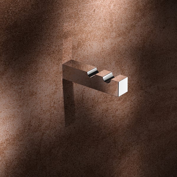 Moderner Wandhaken aus Metall mit zwei Einkerbungen zur Befestigung an der Wand