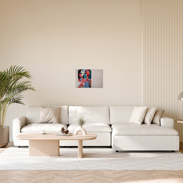 Abstraktes Leinwandbild mit Figuren an einer Wand über einem Sofa