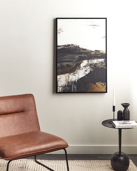 Rückseite einer runden Wanduhr mit Uhrwerk