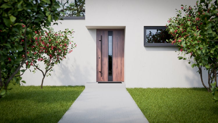 Eingangsbereich eines Hauses mit Holztür, Fenster und gepflastertem Weg durch den Garten