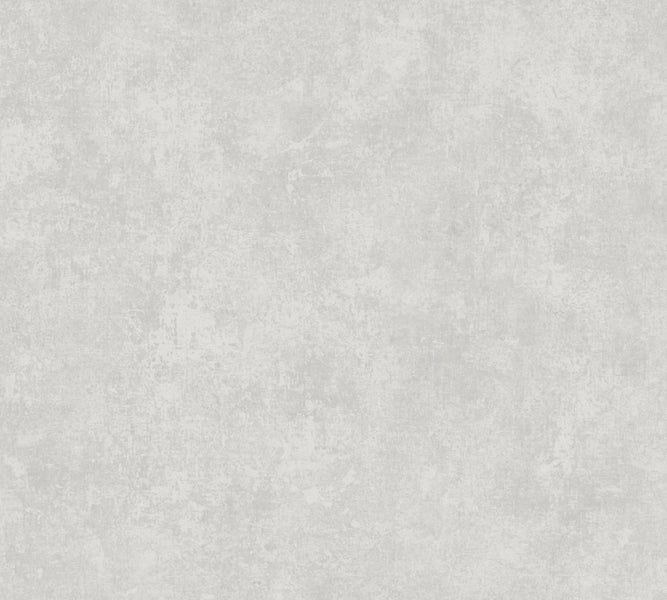 Wohnzimmer mit Sofa, Stuhl, Kommode, Pflanzen und gemustertem Teppich