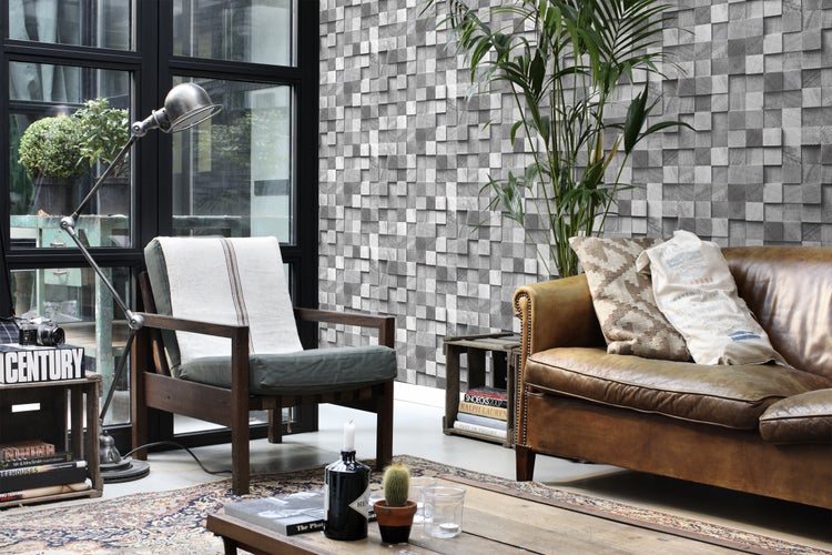 Wohnzimmer mit Sessel, Sofa, Stehlampe, Couchtisch und Holzpaneelwand