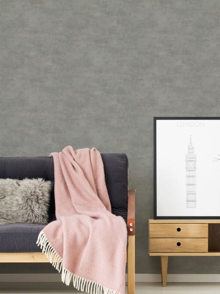 Wohnzimmer mit Sofa, Couchtisch, Teppich und Stehlampe