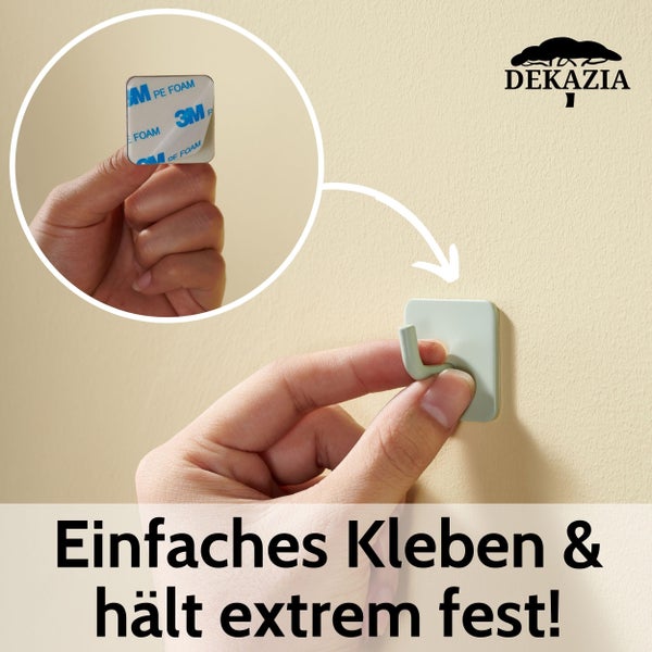 Selbstklebender Wandhaken von Dekazia mit 3M Klebepad wird an eine Wand angebracht.