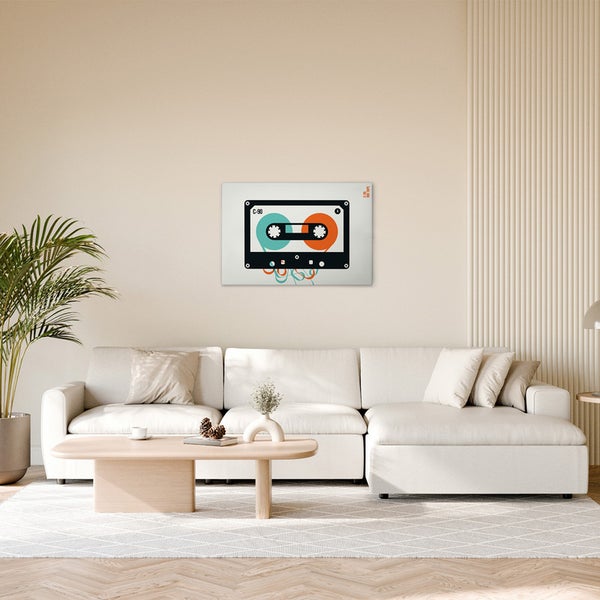 Dekorative Leinwand mit Kassettenmotiv in einem Wohnzimmer