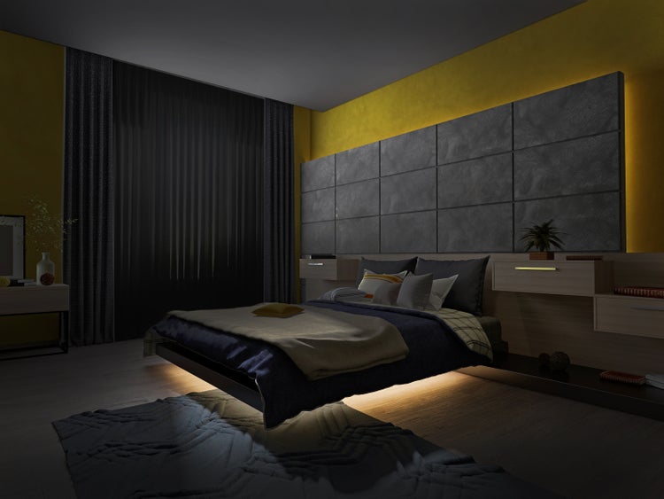 Schlafzimmer mit Bett, Nachttischen und Wandpaneelen
