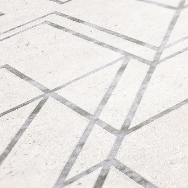 Schlafzimmer mit geometrischer Tapete, Bett und Fenster