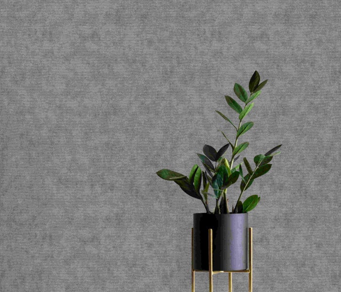 Einrichten eines Raumes mit floraler Tapete und Holzschrank