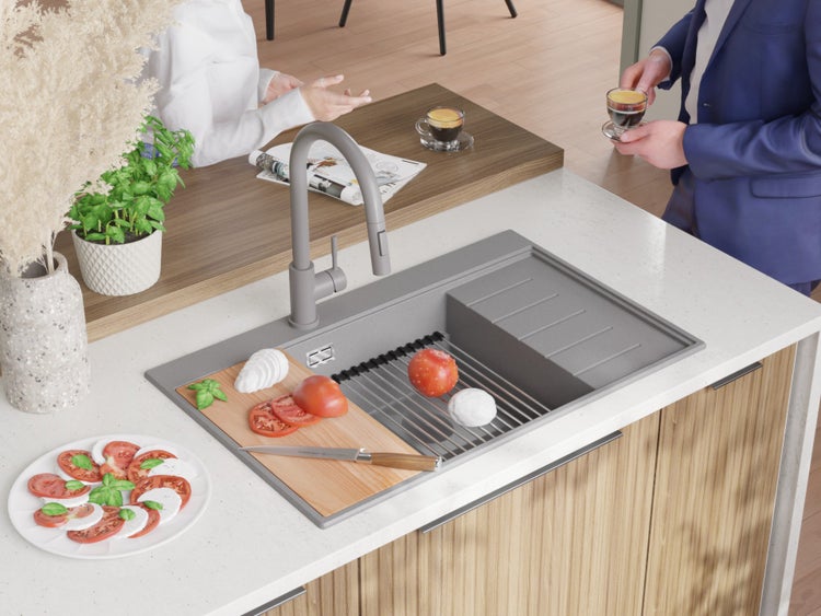 Spüle aus Stein mit Abtropffläche und Armatur im Küchendesign