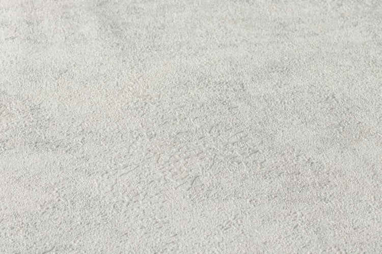 Einrichtungsgegenstand mit Rautenmuster-Tapete, Kommode und dekorativen Elementen