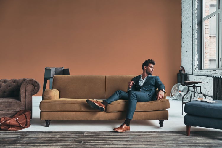 Schild mit dem Spruch: Ein Haus ist kein Heim ohne eine Dogge